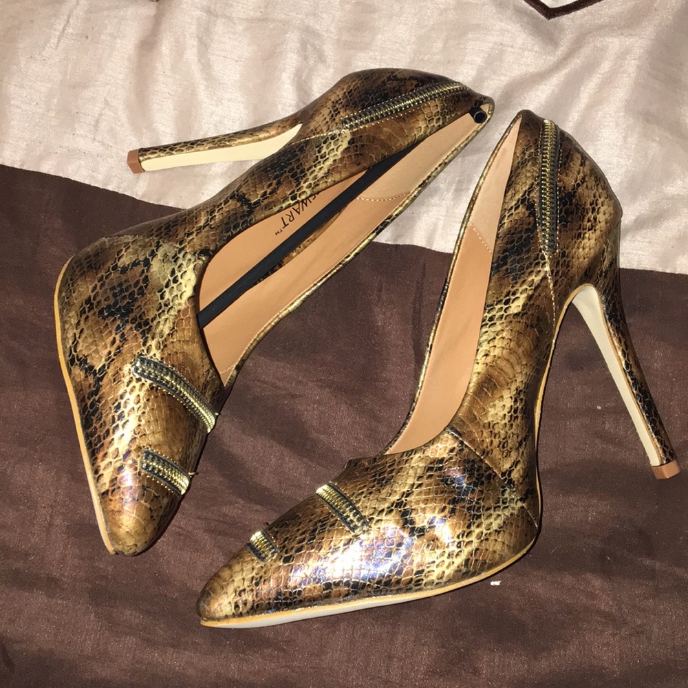 Never worn snake skin heels with zipper